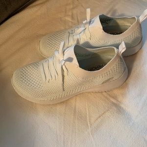 Sketchers white they have a shimmer to them.